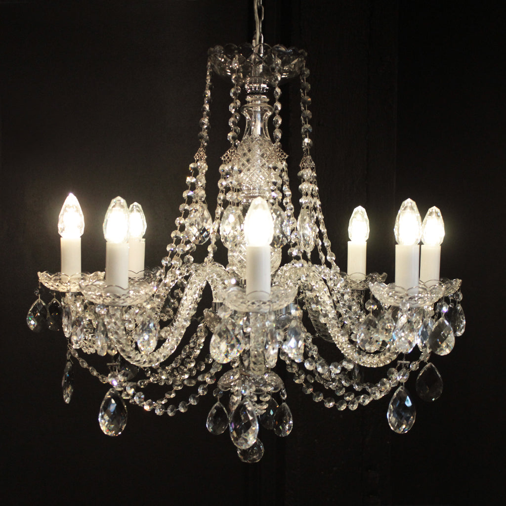 Chrome and clear crystal chandelier with eight bulbs