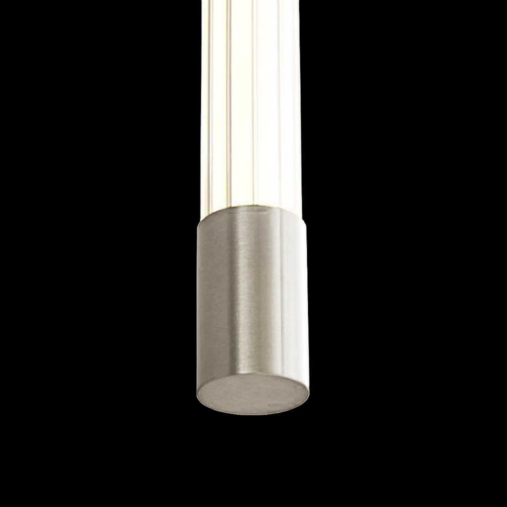 Close up of a tall narrow pendant light with silver nickel accents and a glowing white central rod, in front of a warm background