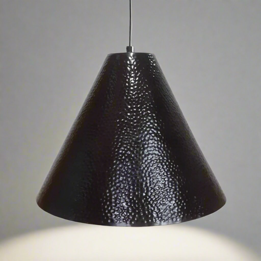 Black textured pendant light against a gray background