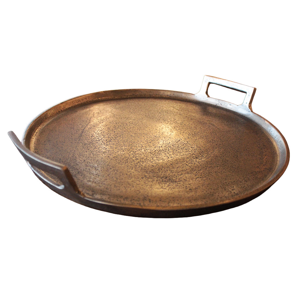 Bronze-colored tray with handles on a white background
