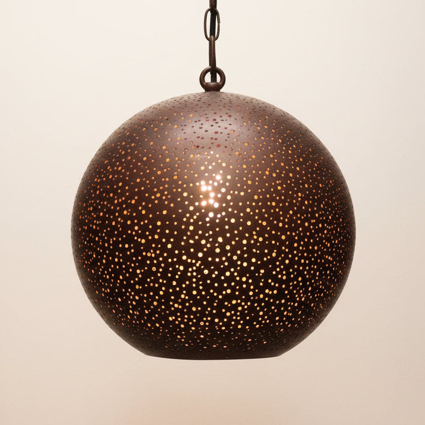 Bronze-colored pendant light with a textured surface on a gray background